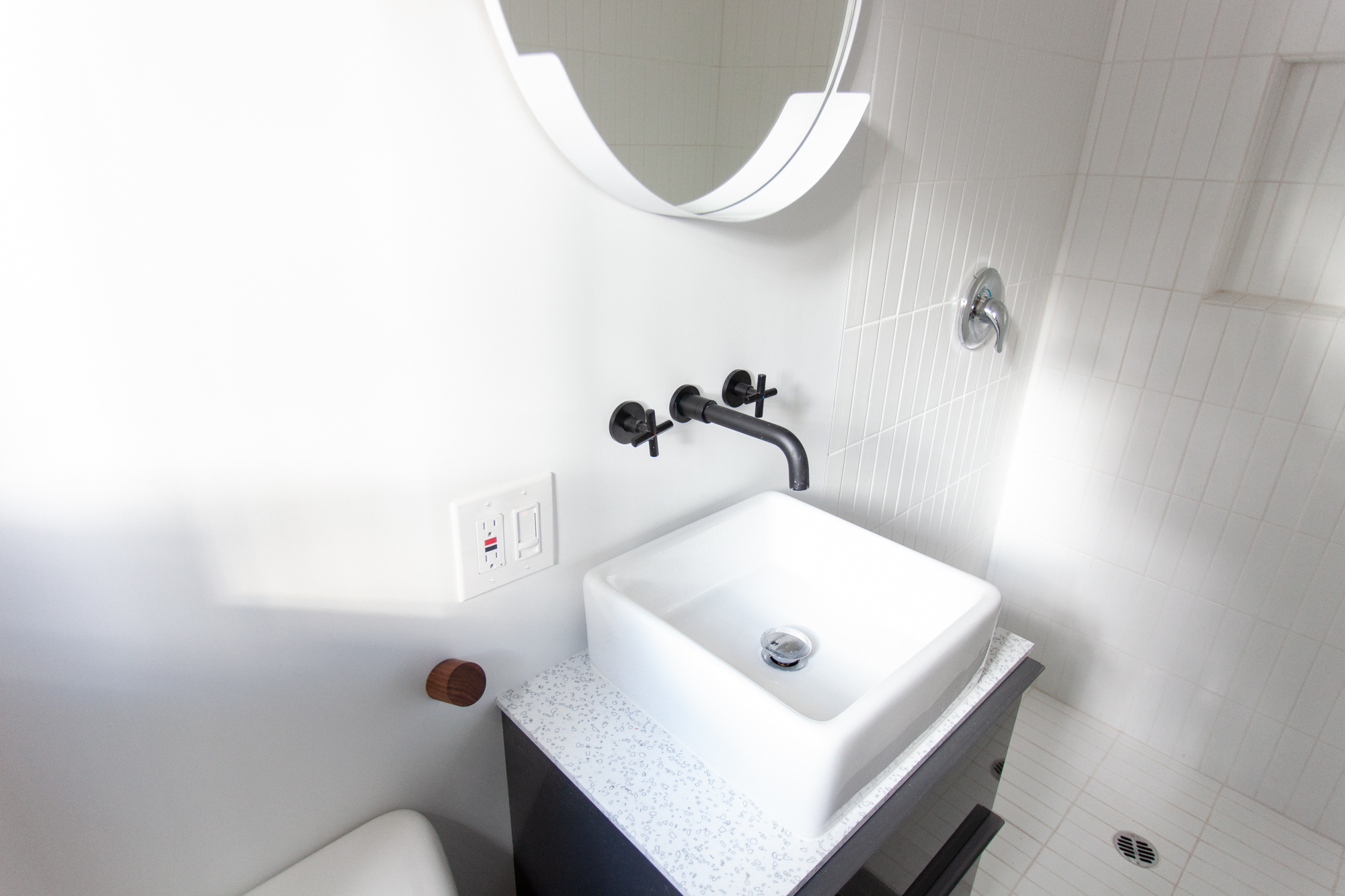 Sleep Inn / C2 bathroom with sink and shower at Colorado Lodge boutique lodge Big Bear Lake