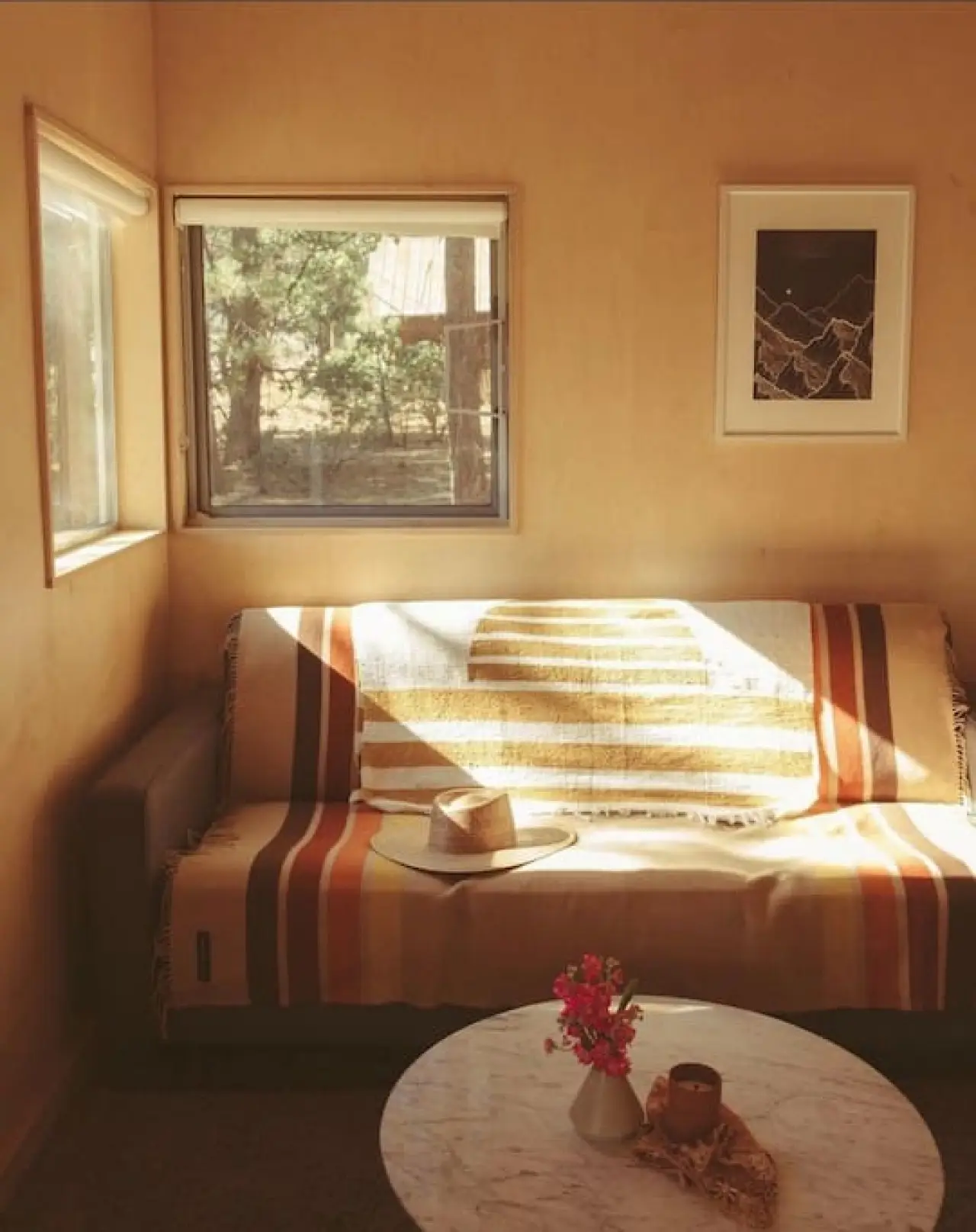 Sleep Inn / C2 warm living room with couch and hat at Colorado Lodge boutique lodge in Big Bear Lake